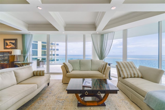 living room with ornamental molding, coffered ceiling, a water view, and expansive windows