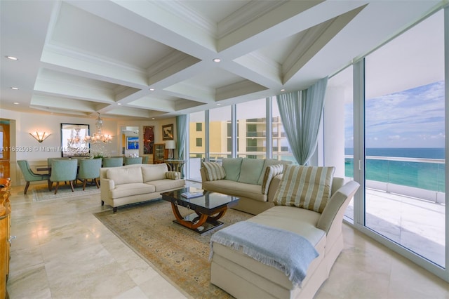 living room featuring coffered ceiling, a water view, a notable chandelier, crown molding, and beam ceiling