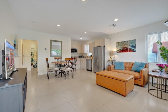 living room featuring light tile patterned floors