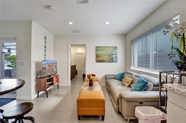 living room featuring light tile patterned floors