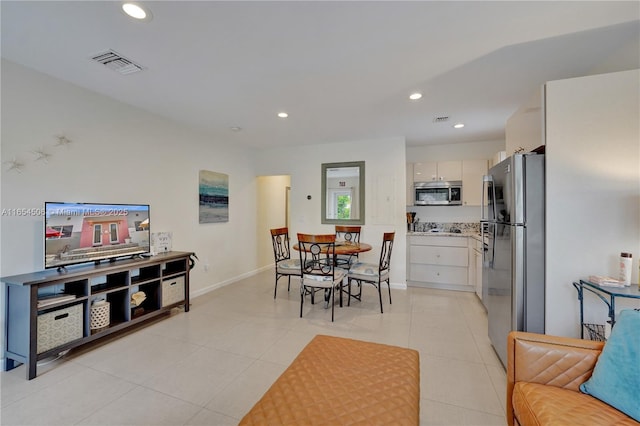 view of tiled dining space