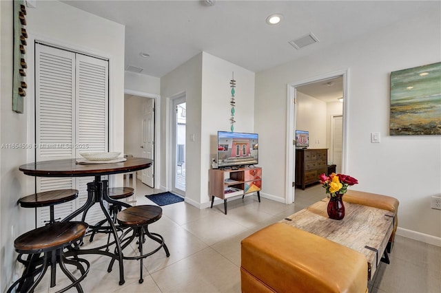 interior space with light tile patterned floors