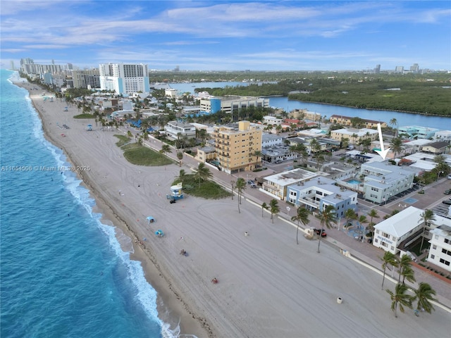 drone / aerial view with a view of the beach and a water view