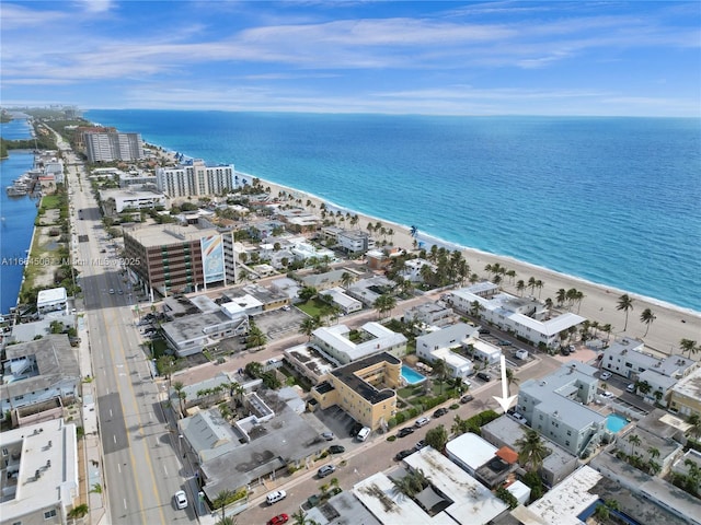 aerial view featuring a water view and a view of the beach