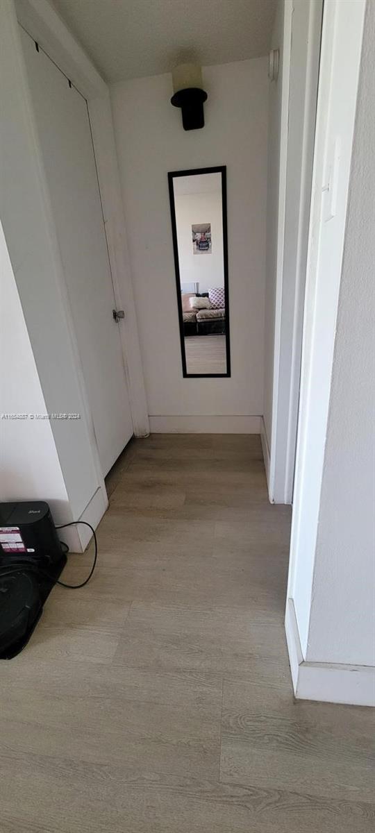 hall featuring light hardwood / wood-style flooring