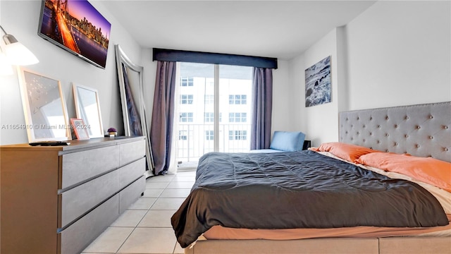 bedroom featuring light tile patterned floors