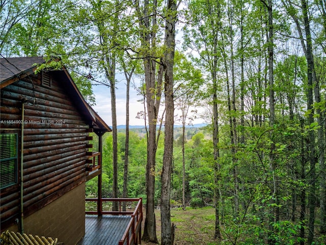 view of yard with a wooden deck