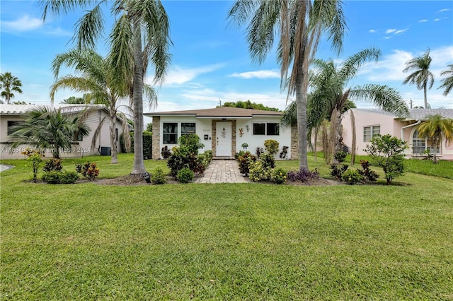 view of front of home with a front lawn