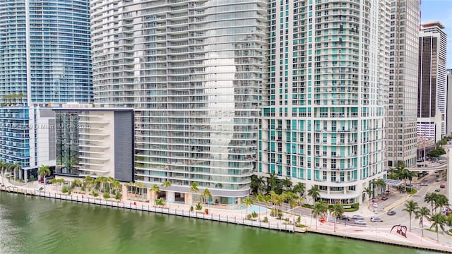 view of building exterior with a water view