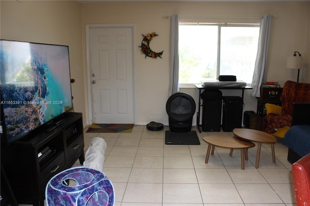 living area featuring light tile patterned floors