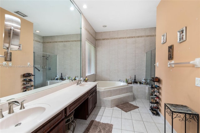 bathroom featuring vanity, separate shower and tub, and tile patterned flooring