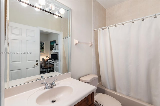 full bathroom with vanity, toilet, and shower / tub combo with curtain