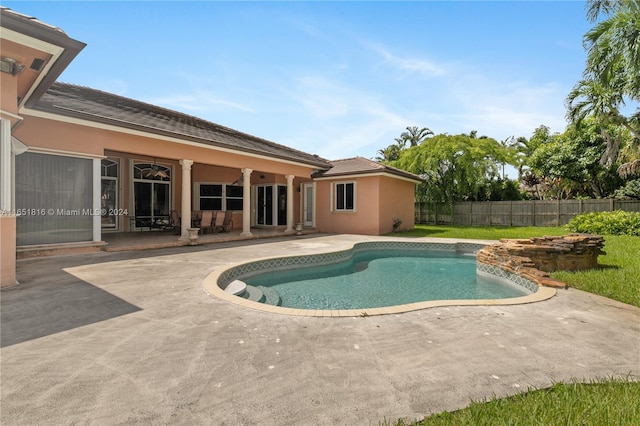 view of pool featuring a patio area