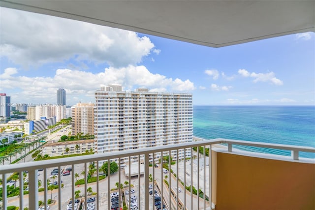 balcony featuring a water view