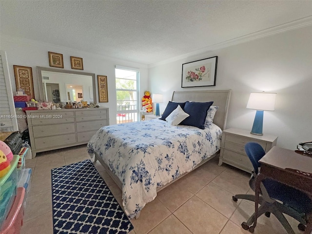 tiled bedroom featuring a textured ceiling and ornamental molding