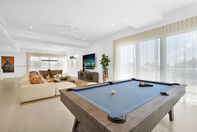 playroom with billiards, light hardwood / wood-style floors, and ceiling fan