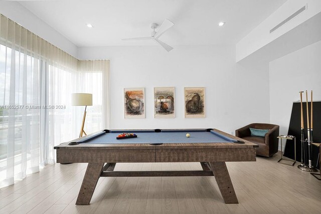 rec room featuring light hardwood / wood-style flooring, ceiling fan, and pool table