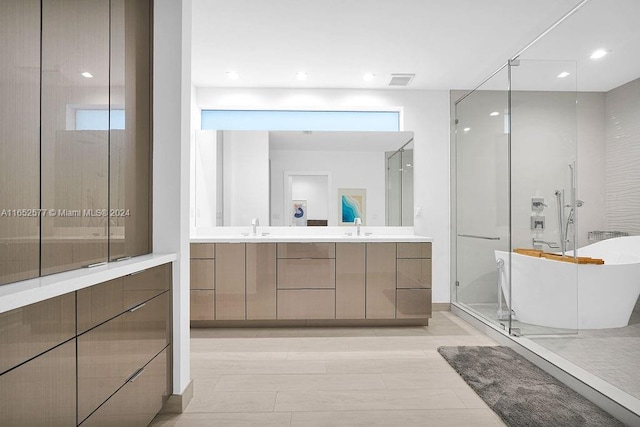 bathroom with vanity, hardwood / wood-style flooring, and shower with separate bathtub