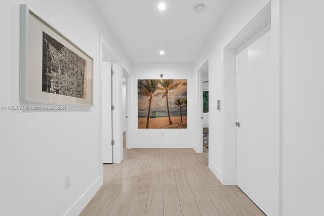 hall featuring light wood-type flooring