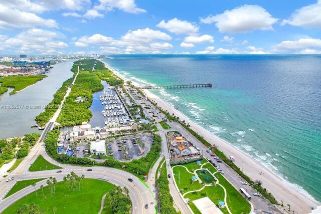 aerial view featuring a beach view and a water view