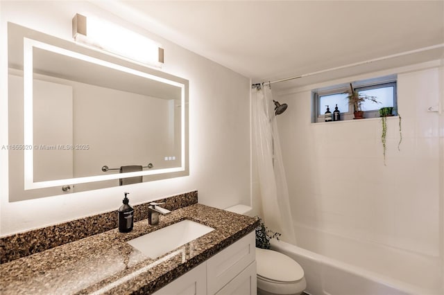 full bathroom featuring toilet, vanity, and shower / tub combo with curtain