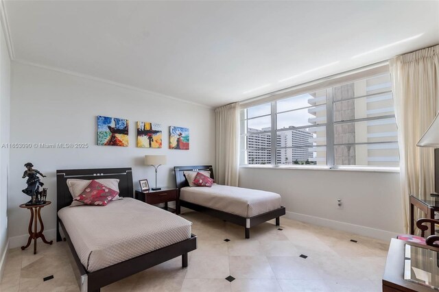 bedroom featuring light tile patterned floors