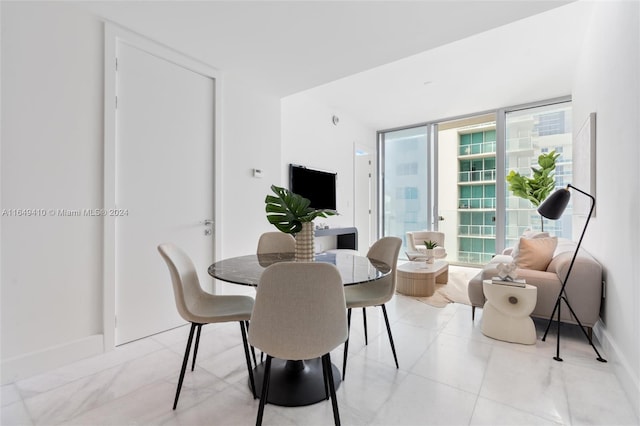 dining space featuring a healthy amount of sunlight