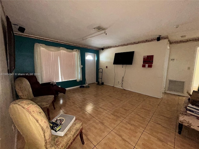 tiled living room with ornamental molding