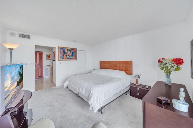 bedroom featuring carpet flooring