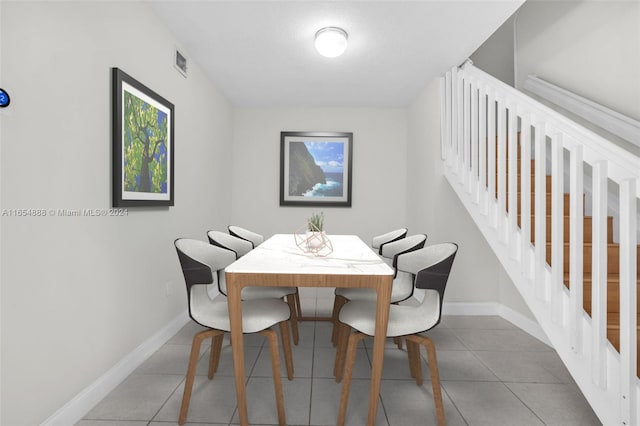 dining area with tile patterned floors