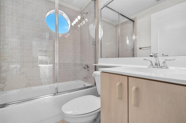 full bathroom with shower / bath combination with glass door, toilet, and vanity