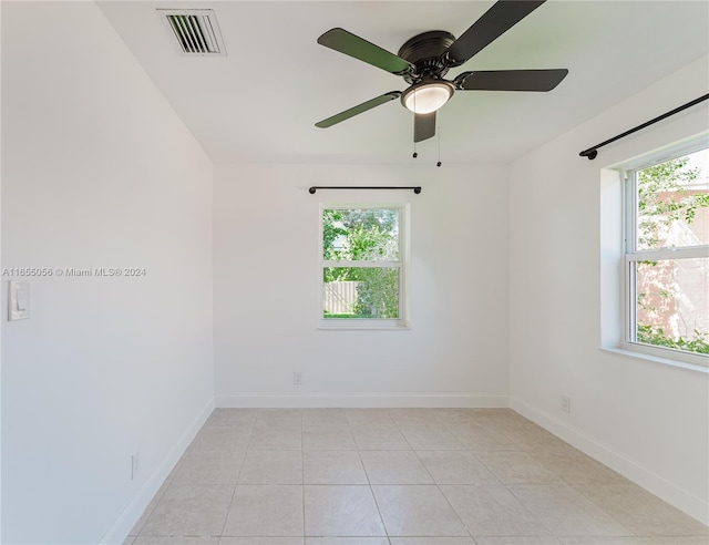 5847 Mayo St, Hollywood, FL 33023 - empty room featuring plenty of natural light, baseboards, and ceiling fan