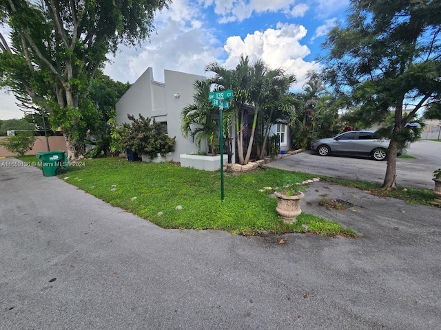 13915 SW 56th Ln Unit 13915, Miami, FL 33183 - view of front of home featuring a front yard and stucco siding