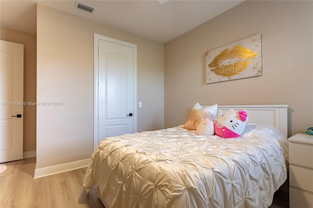 bedroom featuring light hardwood / wood-style flooring