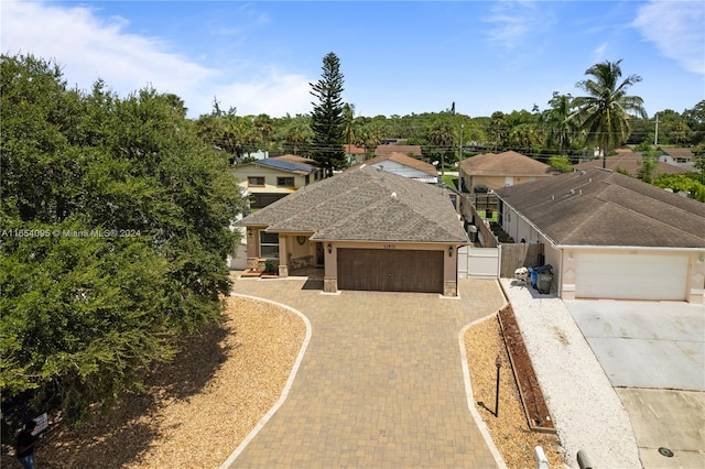 view of front of property featuring a garage