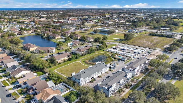 drone / aerial view with a water view