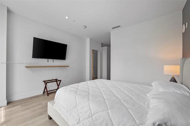 bedroom featuring light wood-type flooring