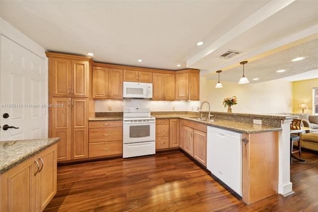 kitchen featuring white appliances, kitchen peninsula, sink, and dark hardwood / wood-style floors