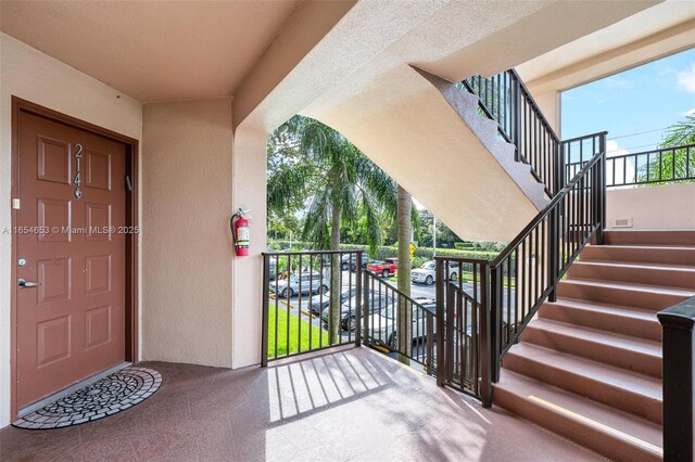 doorway to property with a balcony