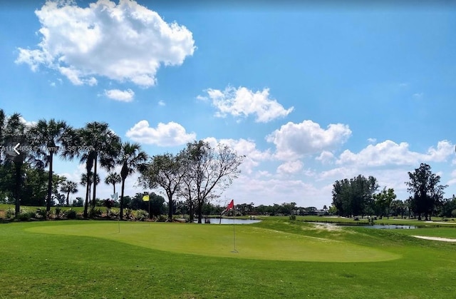 view of community featuring view of golf course