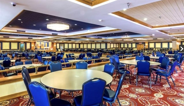 dining room featuring a raised ceiling