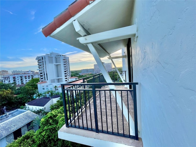 view of balcony at dusk