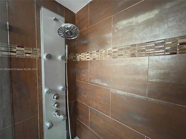 details with a tile shower