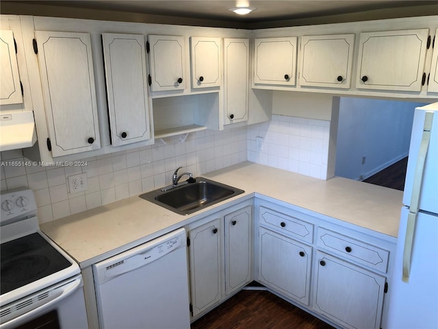 kitchen featuring dark hardwood / wood-style floors, white appliances, sink, decorative backsplash, and white cabinets