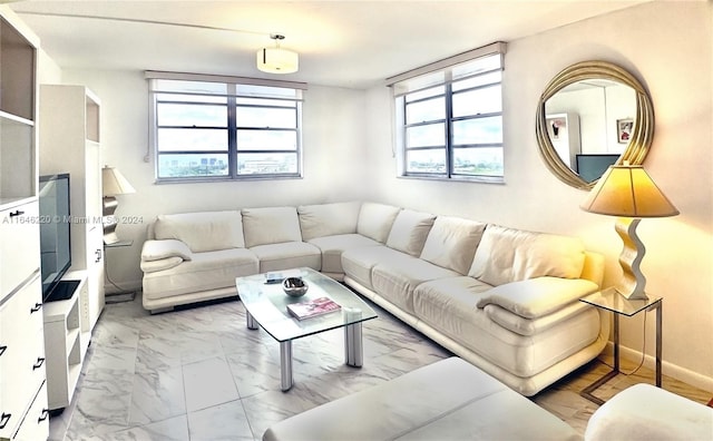 living room featuring a wealth of natural light