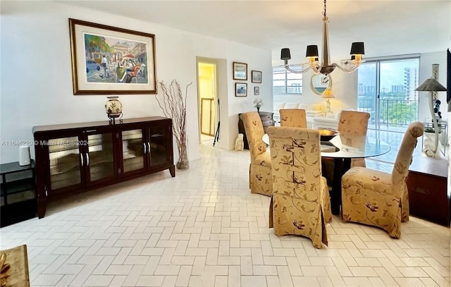 dining room with a chandelier