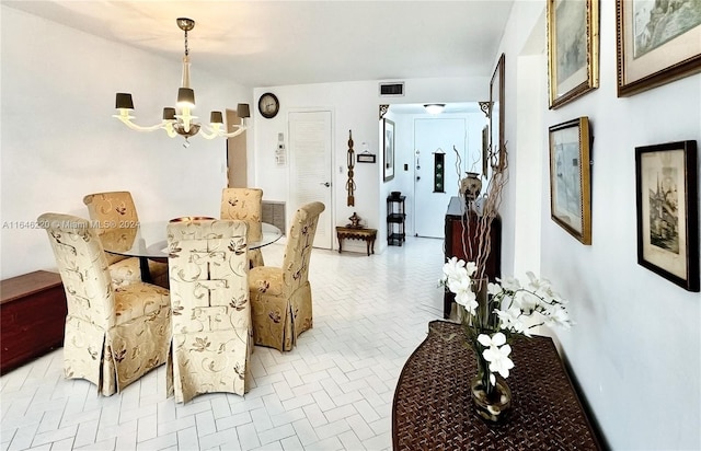 dining area featuring a chandelier