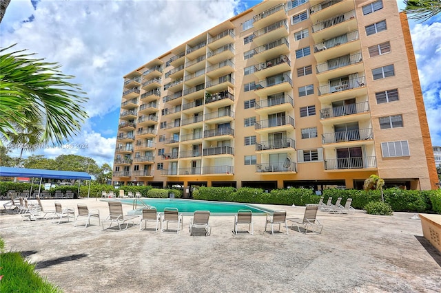 exterior space featuring a community pool