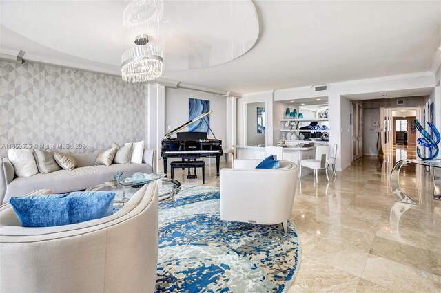 living room featuring an inviting chandelier and crown molding