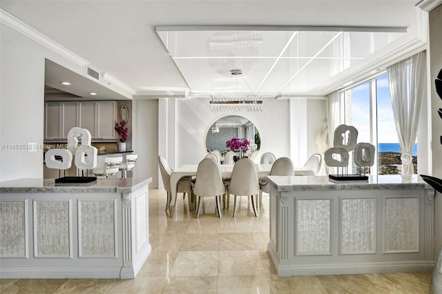 dining area with ornamental molding